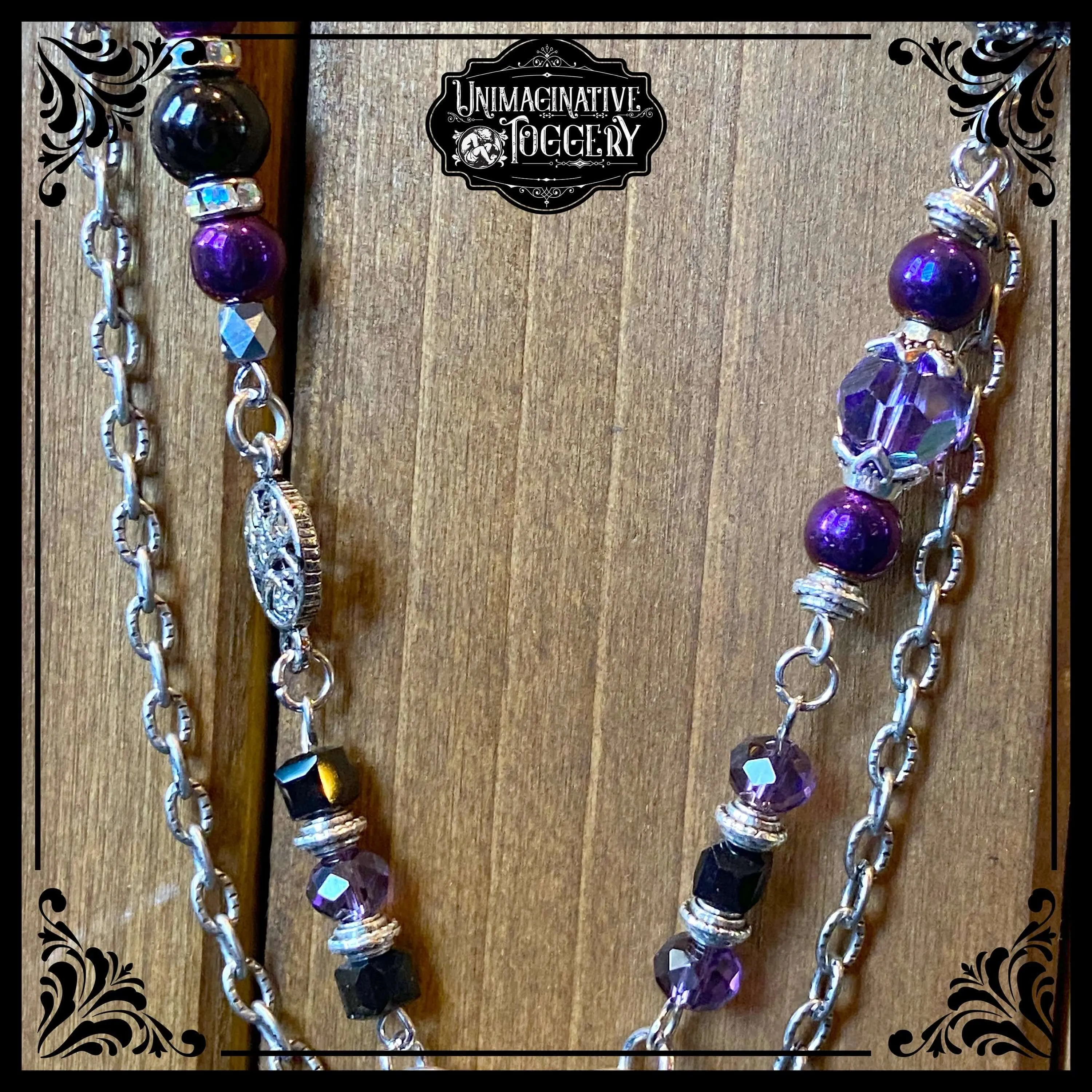 Silver and purple multi strand necklace