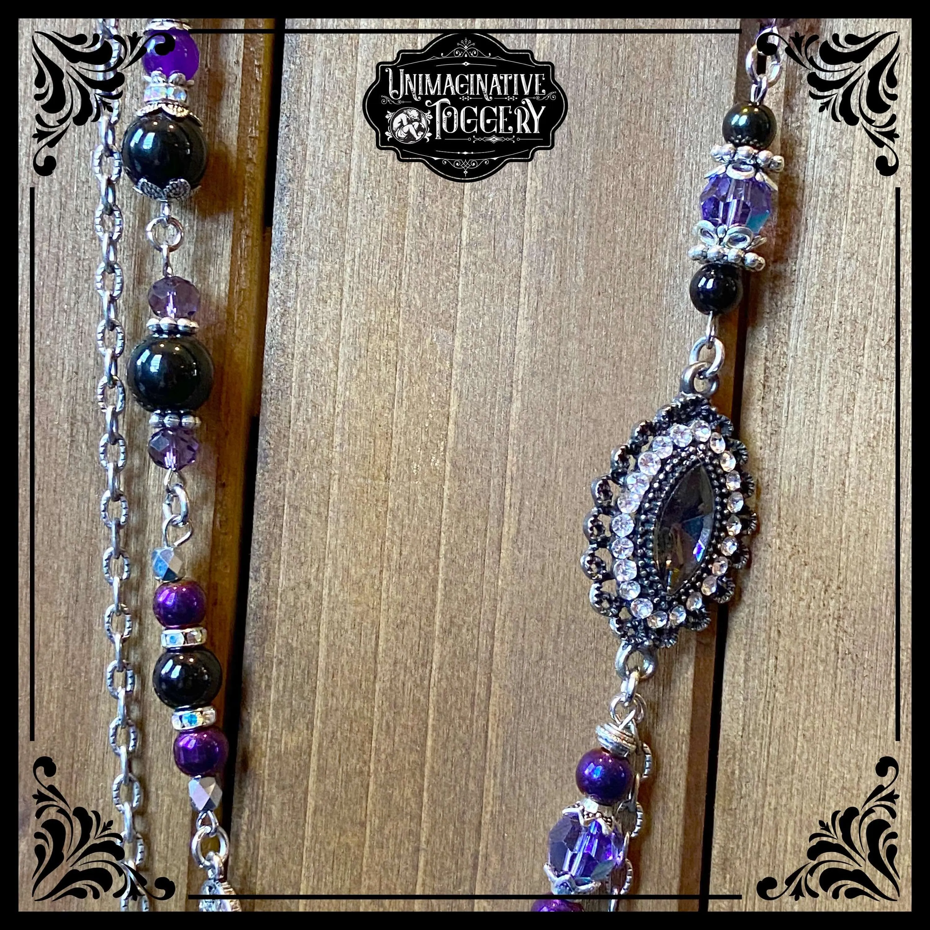 Silver and purple multi strand necklace